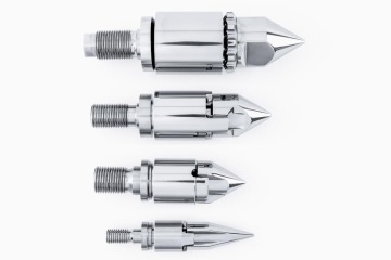 Dysze wtryskowe – zestaw precyzyjnych stalowych końcówek o różnych rozmiarach, przeznaczonych do formowania wtryskowego.
